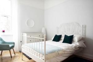 Ένα ή περισσότερα κρεβάτια σε δωμάτιο στο Stylish City Centre Apartments - D Terrace Residence