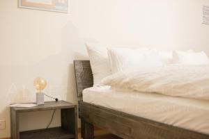 Katil atau katil-katil dalam bilik di Albergo Diffuso Porrentruy