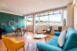 Posezení v ubytování tuGuest Clave de Sol Apartment