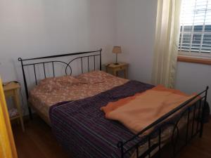 En eller flere senger på et rom på MORADIA-BARCO DO PORTO