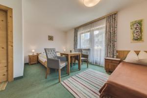 Postel nebo postele na pokoji v ubytování Haus Kristall