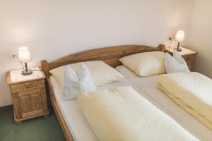 Postel nebo postele na pokoji v ubytování Haus Kristall