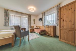Postel nebo postele na pokoji v ubytování Haus Kristall