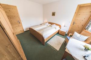 Postel nebo postele na pokoji v ubytování Haus Kristall