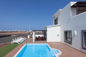 Basen w obiekcie Hipoclub Villas, Aguamarina 4 lub w pobliżu