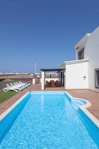 Basen w obiekcie Hipoclub Villas, Aguamarina 4 lub w pobliżu