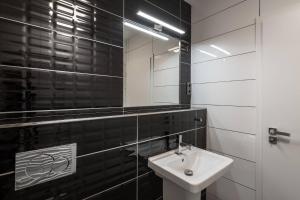 Koupelna v ubytování Hotel Grand