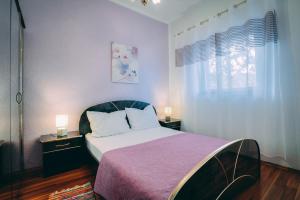 Postel nebo postele na pokoji v ubytování Apartment Lana