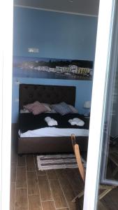 Posteľ alebo postele v izbe v ubytovaní Casa Vacanze Riva Destra