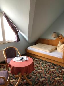Postel nebo postele na pokoji v ubytování Pension Preussenstraße Leipzig