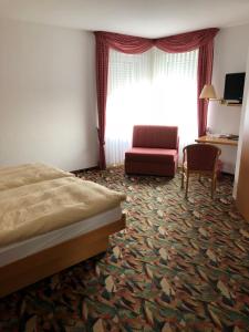 Postel nebo postele na pokoji v ubytování Pension Preussenstraße Leipzig