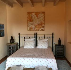 מיטה או מיטות בחדר ב-Casa yeya