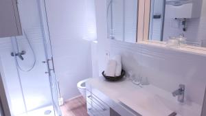 Koupelna v ubytování Nu-Apartments + 35 fotografií