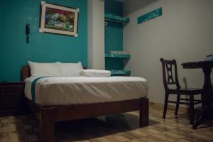 Hotel Real Chimbote客房内的一张或多张床位