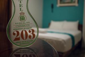 Hotel Real Chimbote客房内的一张或多张床位
