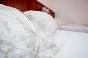 Voodi või voodid majutusasutuse Hotel Acapulco toas