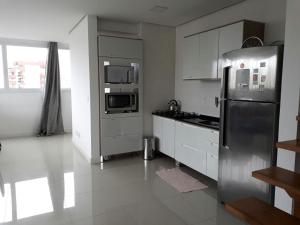 A kitchen or kitchenette at Sonatta