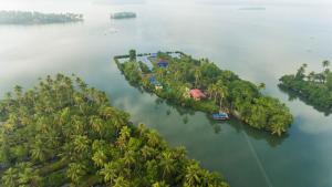an island in the middle of a body of water at Munroe Eco Camp in Munroe Island