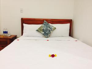 Postel nebo postele na pokoji v ubytování CANH DUONG MOTEL