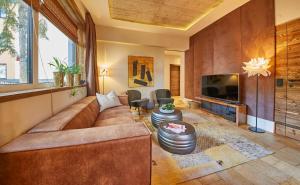 Χώρος καθιστικού στο LALA home Chalet & Appartement