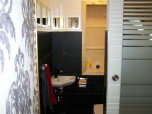 Koupelna v ubytování Loft-Ferienwohnung zur "Kfz-Schenke"