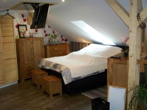 Postel nebo postele na pokoji v ubytování Loft-Ferienwohnung zur "Kfz-Schenke"