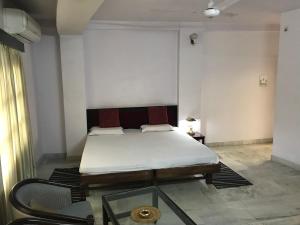 Giường trong phòng chung tại Mewar Inn +54 ảnh