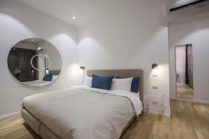 Posteľ alebo postele v izbe v ubytovaní Dimoro Suite