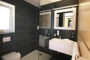 Koupelna v ubytování BG Hotel by WMM Hotels