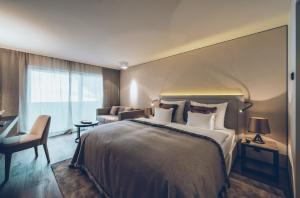 Voodi või voodid majutusasutuse Elizabeth Arthotel Adults Only toas