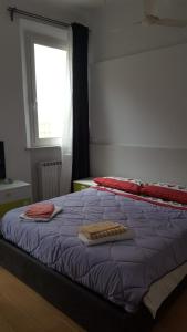 מיטה או מיטות בחדר ב-Carlo Mayr Apartment