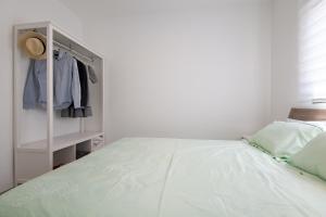 Voodi või voodid majutusasutuse Maorissimo Boutique Apartment toas