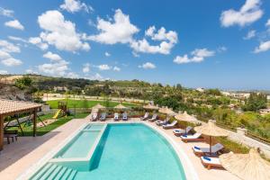 The swimming pool at or close to Ino Villa, Unique Group Gatherings, By ThinkVilla