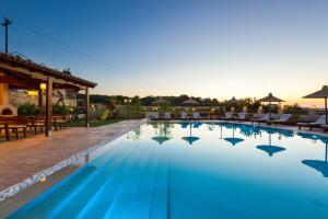 The swimming pool at or close to Ino Villa, Unique Group Gatherings, By ThinkVilla