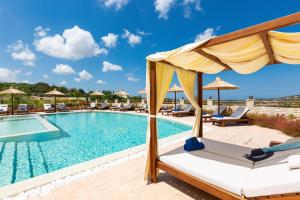 The swimming pool at or close to Ino Villa, Unique Group Gatherings, By ThinkVilla