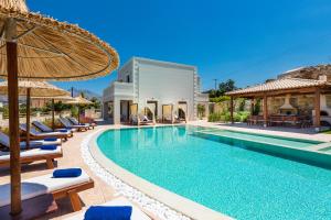 The swimming pool at or close to Ino Villa, Unique Group Gatherings, By ThinkVilla
