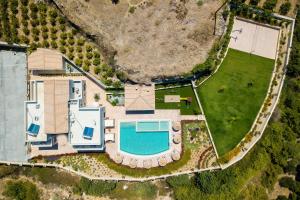 The swimming pool at or close to Ino Villa, Unique Group Gatherings, By ThinkVilla