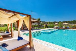 The swimming pool at or close to Ino Villa, Unique Group Gatherings, By ThinkVilla