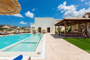The swimming pool at or close to Ino Villa, Unique Group Gatherings, By ThinkVilla