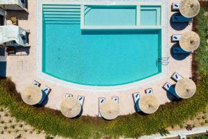 The swimming pool at or close to Ino Villa, Unique Group Gatherings, By ThinkVilla