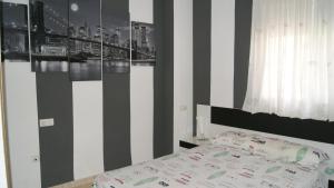 Postel nebo postele na pokoji v ubytování Apartamento 1ª línea de playa VT-35658-CS