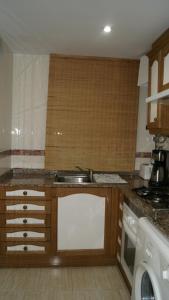 Kuchyň nebo kuchyňský kout v ubytování Apartamento 1ª línea de playa VT-35658-CS