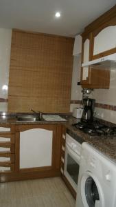 Kuchyň nebo kuchyňský kout v ubytování Apartamento 1ª línea de playa VT-35658-CS