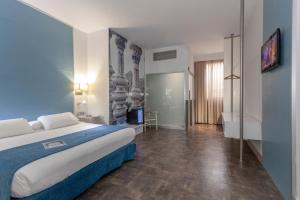 Postel nebo postele na pokoji v ubytování AACR Hotel Monteolivos + 37 fotografií