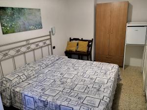 Postel nebo postele na pokoji v ubytování Albergo Al Carugio