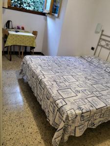 Postel nebo postele na pokoji v ubytování Albergo Al Carugio