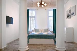 
Кровать или кровати в номере Отель Апельсин на Курской
