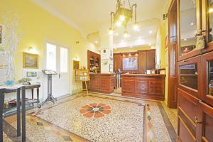 Kuchyň nebo kuchyňský kout v ubytování Hotel Villa Astra