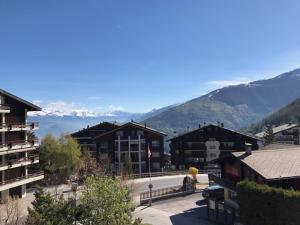 a view of a town with mountains in the background at Greppon Blanc A2 in Nendaz