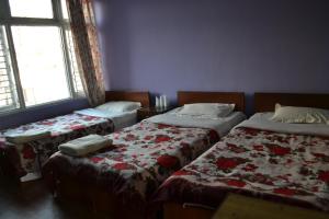 Postel nebo postele na pokoji v ubytování Hotel Discovery Inn